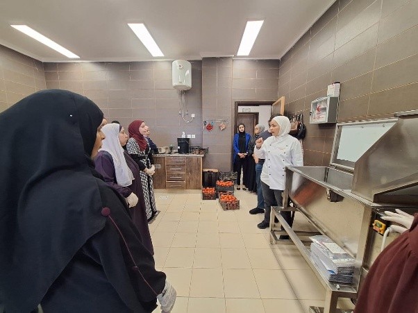 Chef Maysaa conducting culinary skills training for women in East Amman