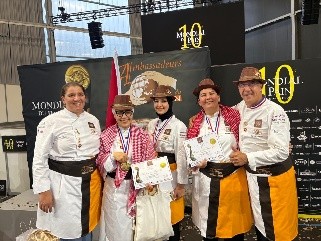 Chef Maysaa receiving her Ambassadeurs du Pain Coach Medal